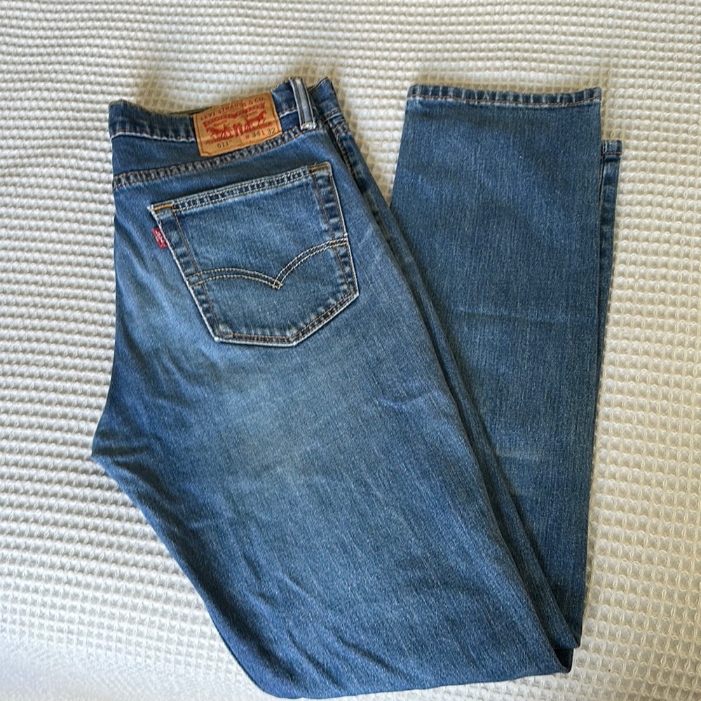 511 Levi Strauss, distressed jeans in like new condition.